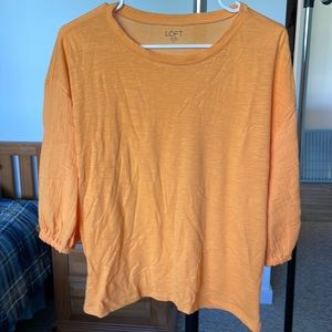 Tangerine lightweight 3/4 sleeve top.